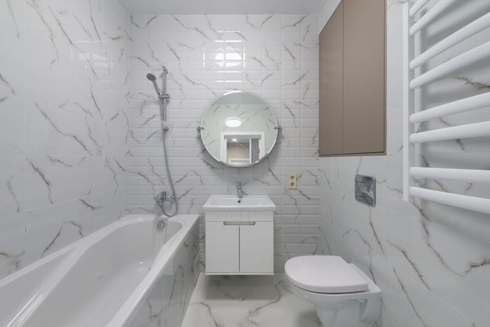 Modern white bathroom with a freestanding bath